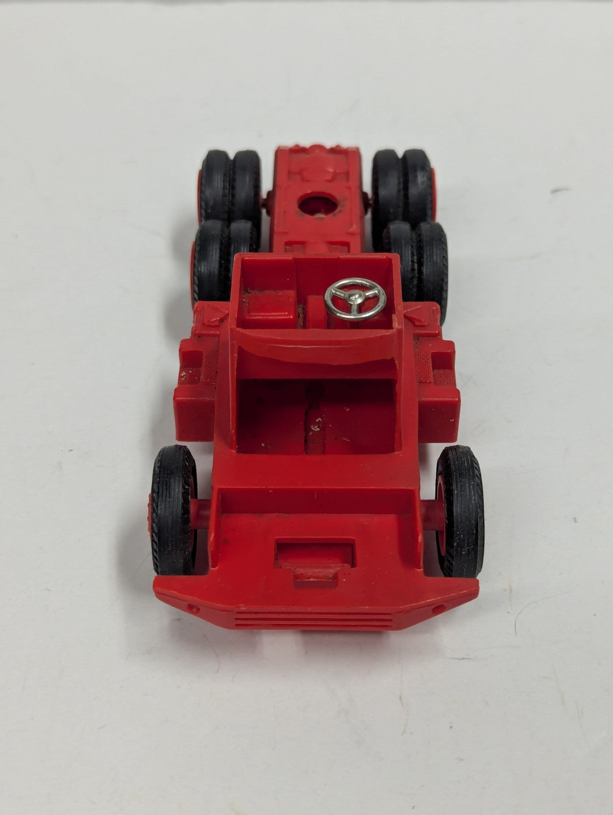 Toy Red Semi Truck Frame Bottom Unknown Possibly Hess Truck (?!)