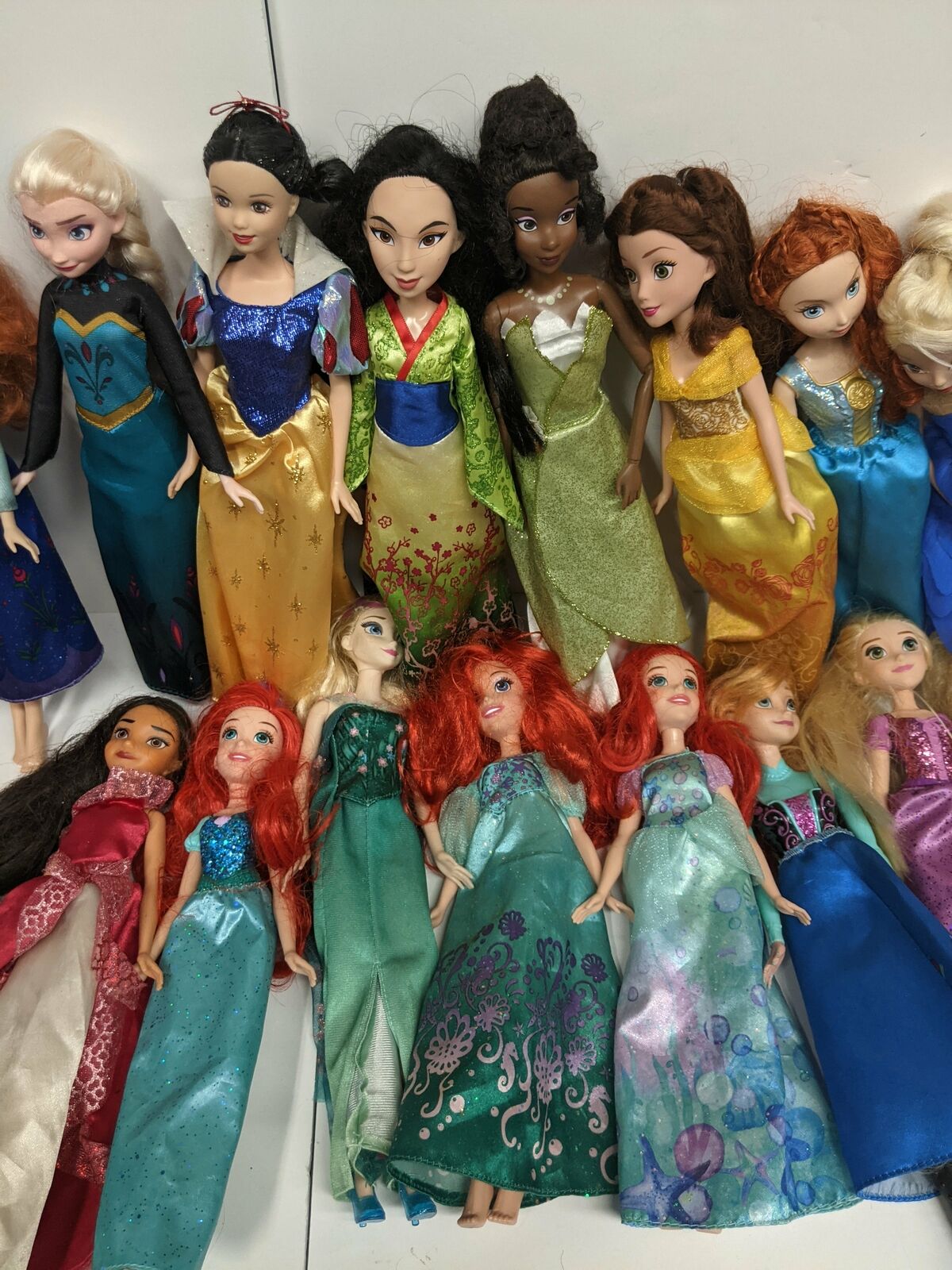 Huge Lot of 19 Disney Dolls, with Talking Tangled Doll